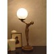 Lampa Art Deco cu o femeie cu o faclie in mana