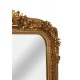 Oglinda din cristal cu o rama aurie cu diverse decoratiuni