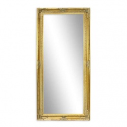Oglinda mare cu o rama aurie cu decoratiuni