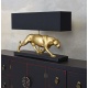 Lampa de masa cu un leopard auriu