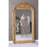 Oglinda baroc din cristal cu o rama aurie antichizata cu decoratiuni